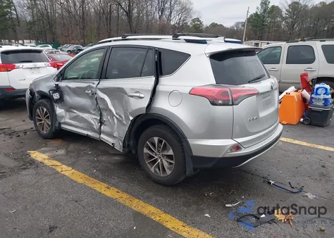 2016 Toyota Rav4 Hybrid Xle z USA, uszkodzony, nr VIN JTMRJREV1GD031063